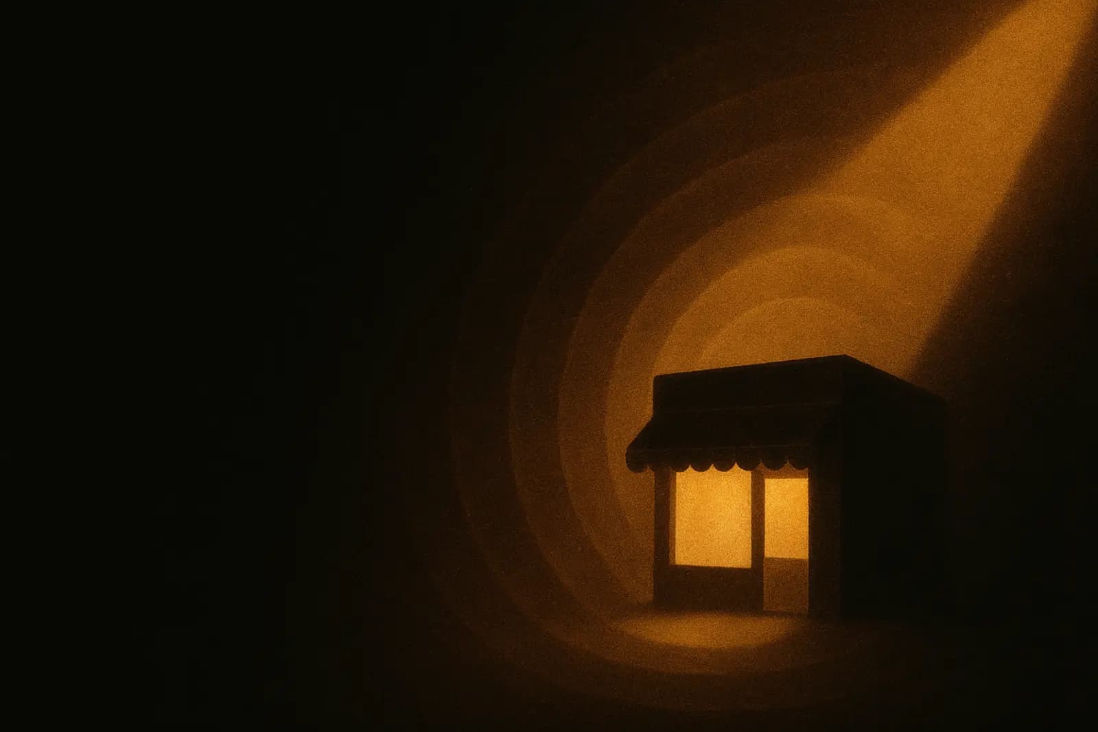 A small business found in the dark by a warm beam of light.